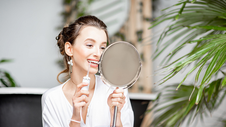 Использование ирригатора фото